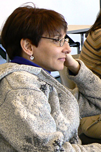 Woman sitting in meeting